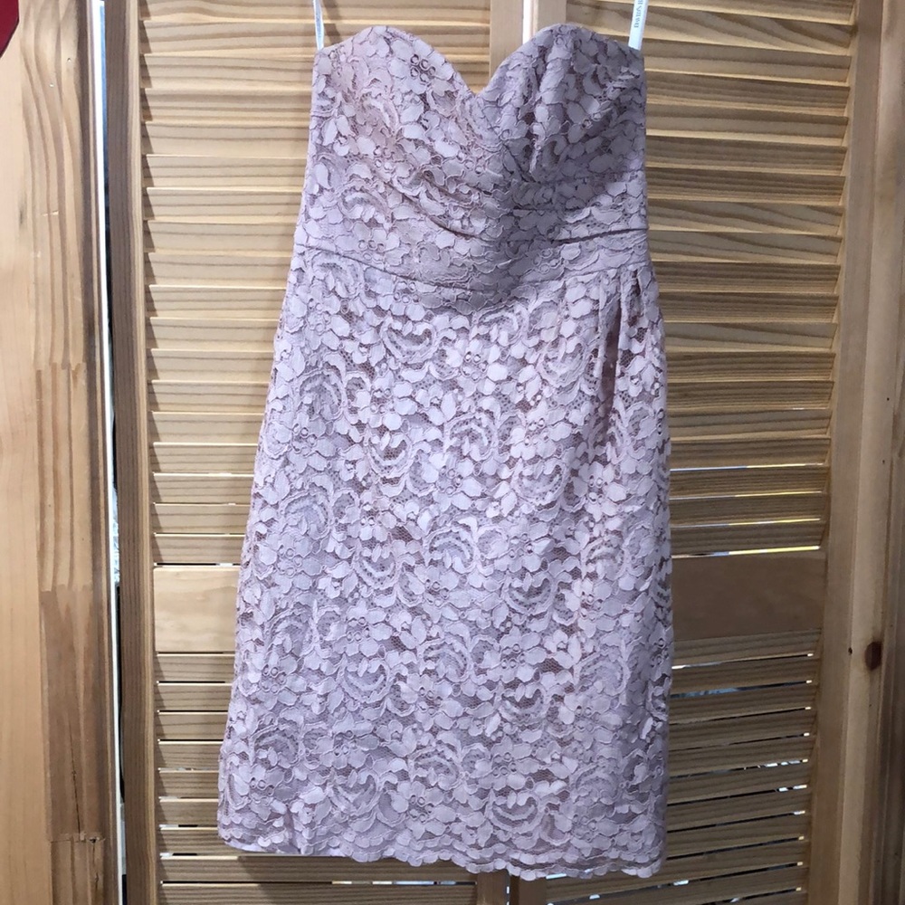 Bridesmaid Dress by David’s Bridal. Size 2. Only wore a few times.
